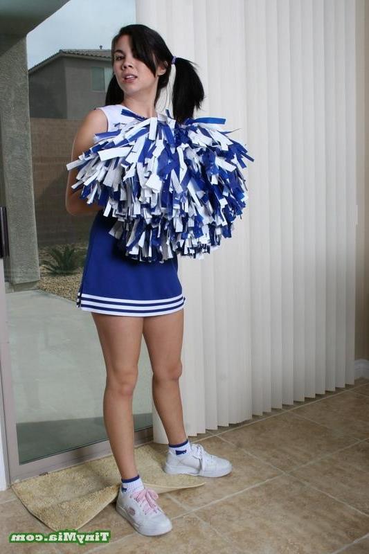 17P Asian Tiny Mia shows off her cheerleader outfit