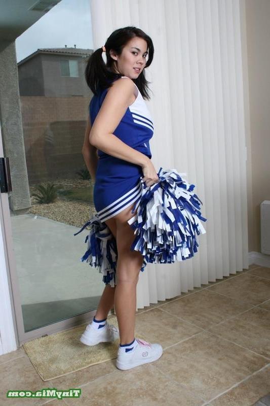17P Asian Tiny Mia shows off her cheerleader outfit