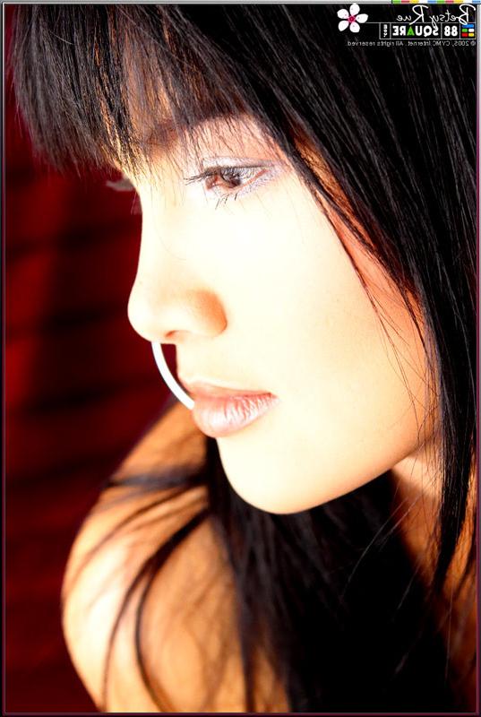 15P Asian model shows her big tits and her tight pussy