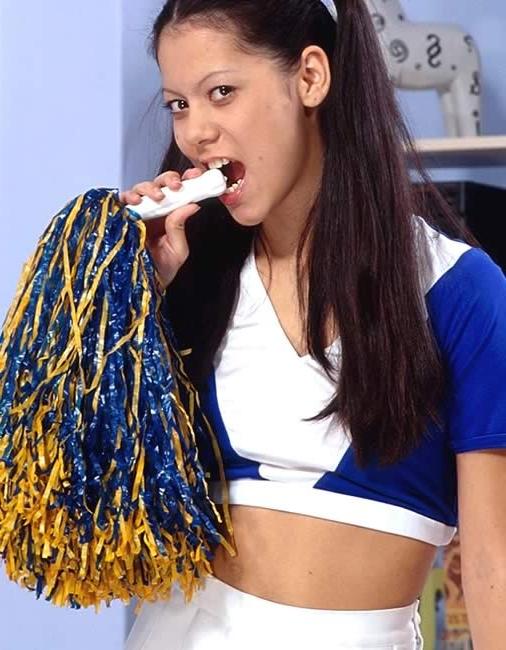 15P Asian cheerleader spreading her legs