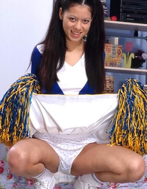 15P Asian cheerleader spreading her legs