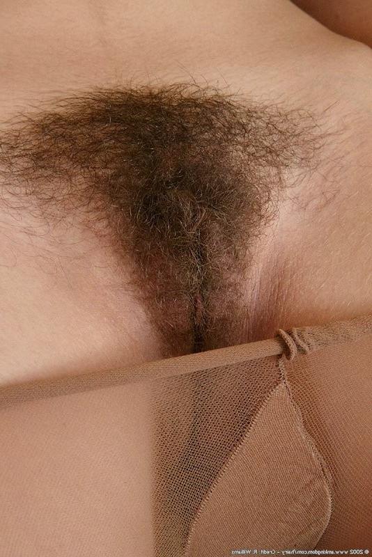15P Dark haired Toni peels off her nylons and shows us munchables