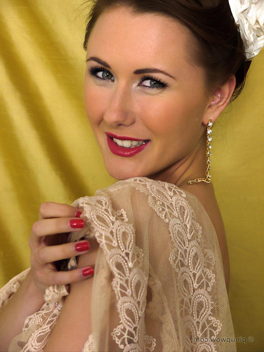 17P Glamorous brunette strips from her figure hugging satin 
