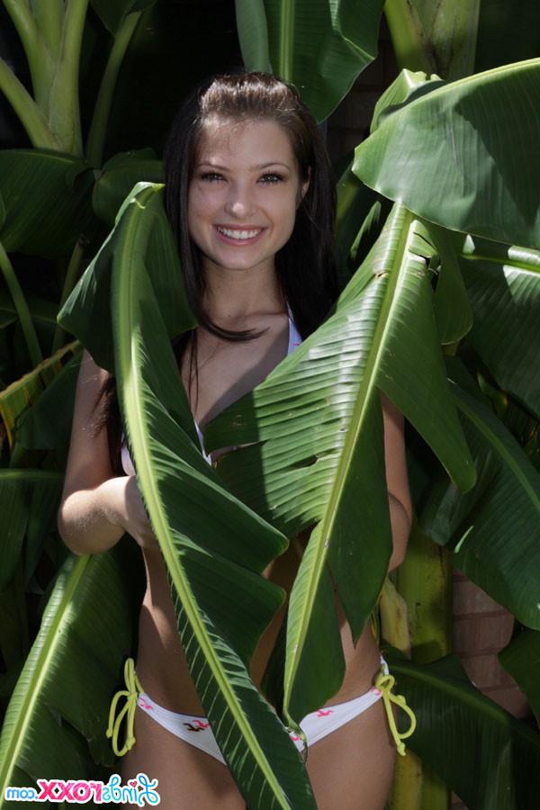 12P Linds Roxx strips off her bikini near a palm tree