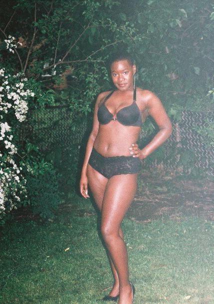 16P Short haired black chick posing and showing her ass