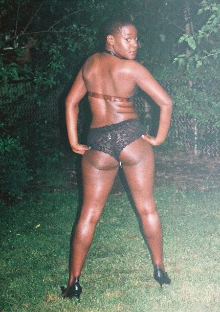 16P Short haired black chick posing and showing her ass
