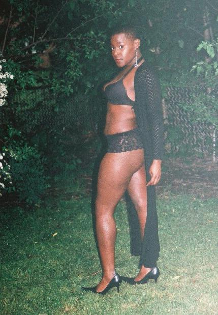 16P Short haired black chick posing and showing her ass