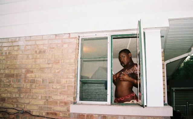 16P Short haired black chick posing and showing her ass