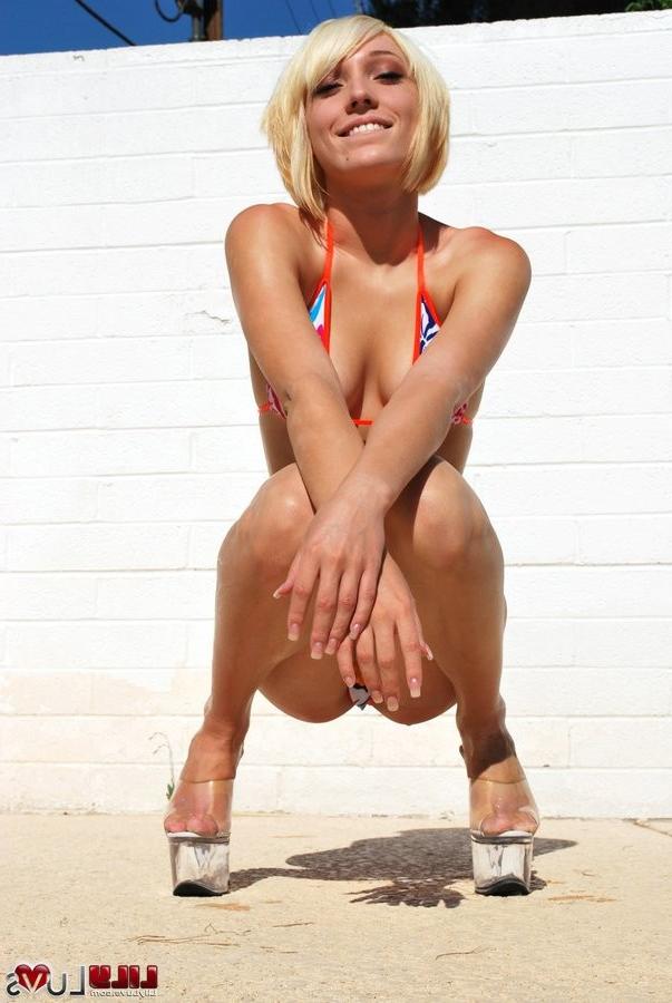 15P Lily Luvs posing in bikini by the pool