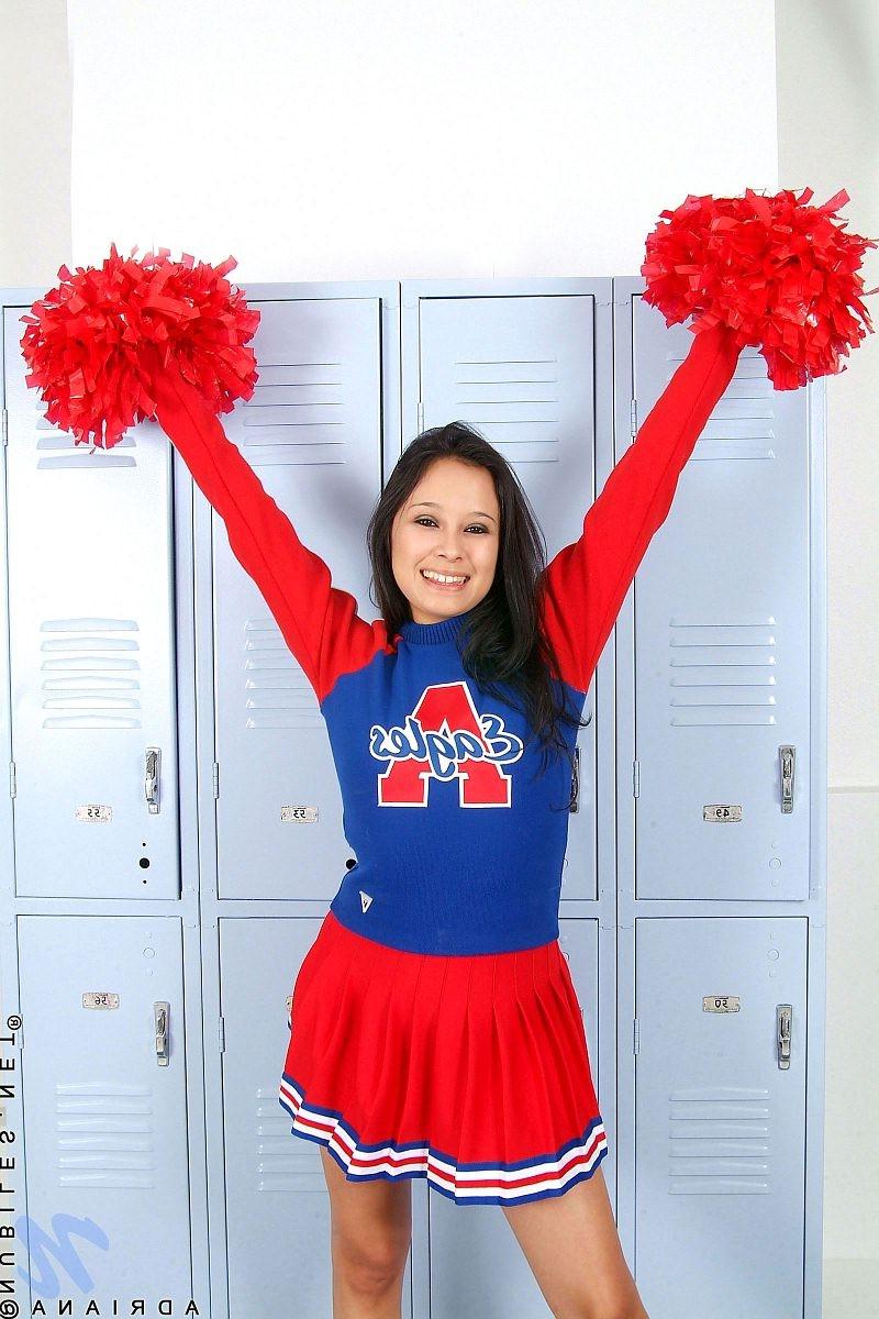 20P Adorable brunette nubile cheerleader posing shaved pussy and ass