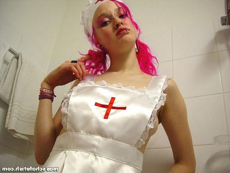 16P Pink haired goth chick Masscha trying out her sexy nurse outfit