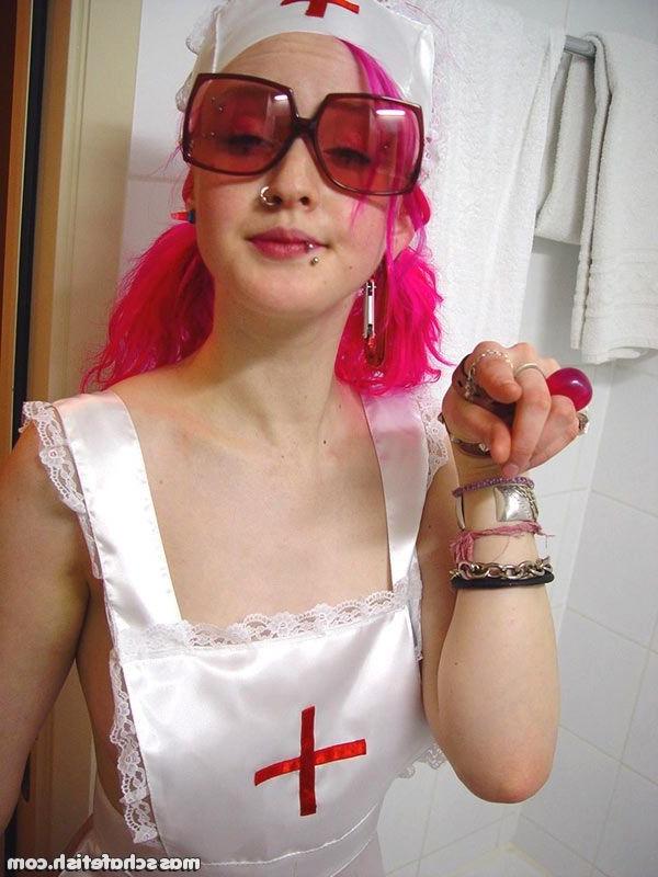 16P Pink haired goth chick Masscha trying out her sexy nurse outfit