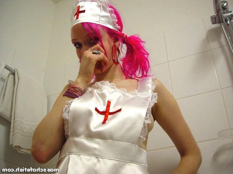 16P Pink haired goth chick Masscha trying out her sexy nurse outfit