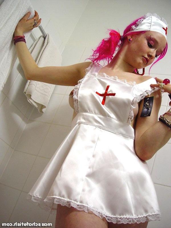 16P Pink haired goth chick Masscha trying out her sexy nurse outfit