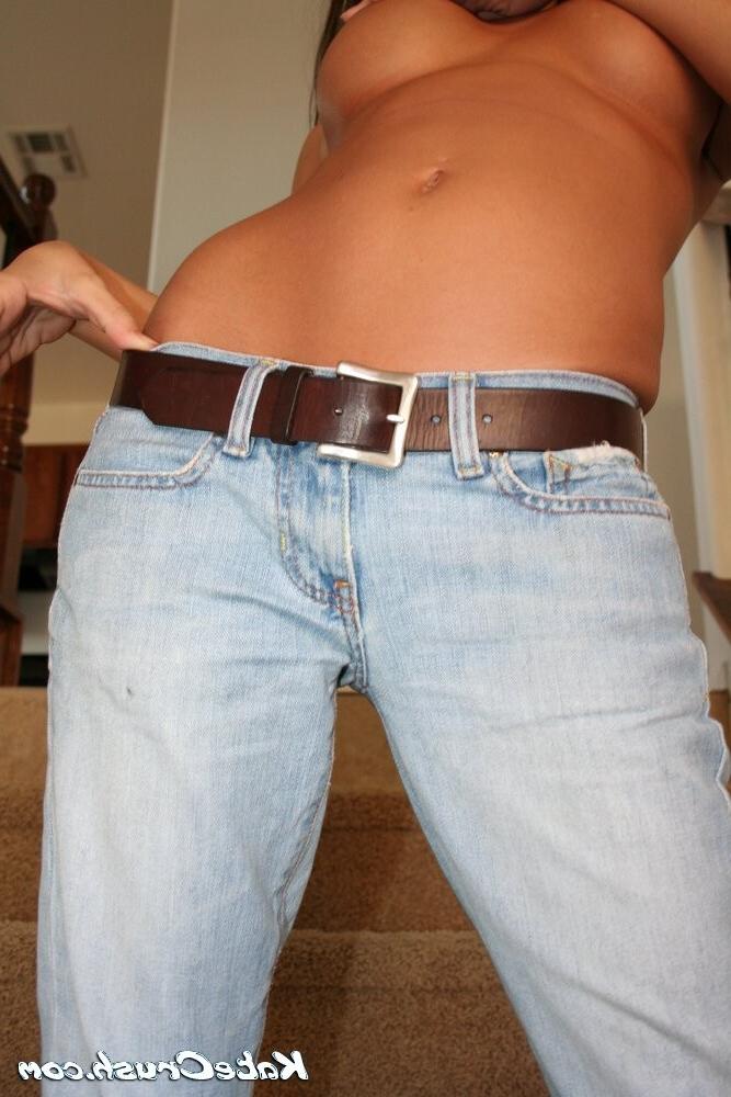 15P Kate on the stairs in worn out jeans