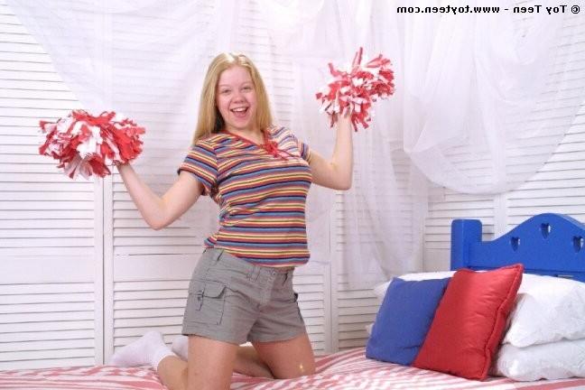 18P Busty Cheerleader Strips And Masturbates