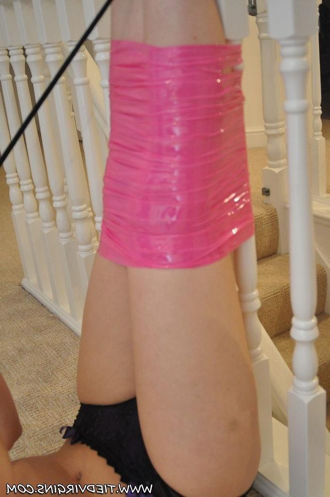 12P Taped and tied up with her legs and ass in the air