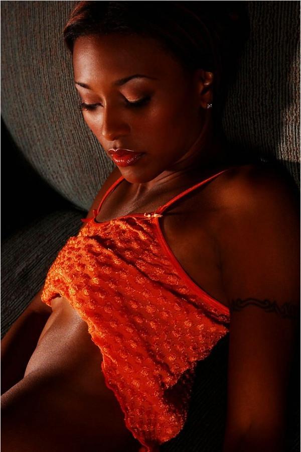 11P Sweet Nicole Narain, is a true stunner in her orange lingerie outfit.