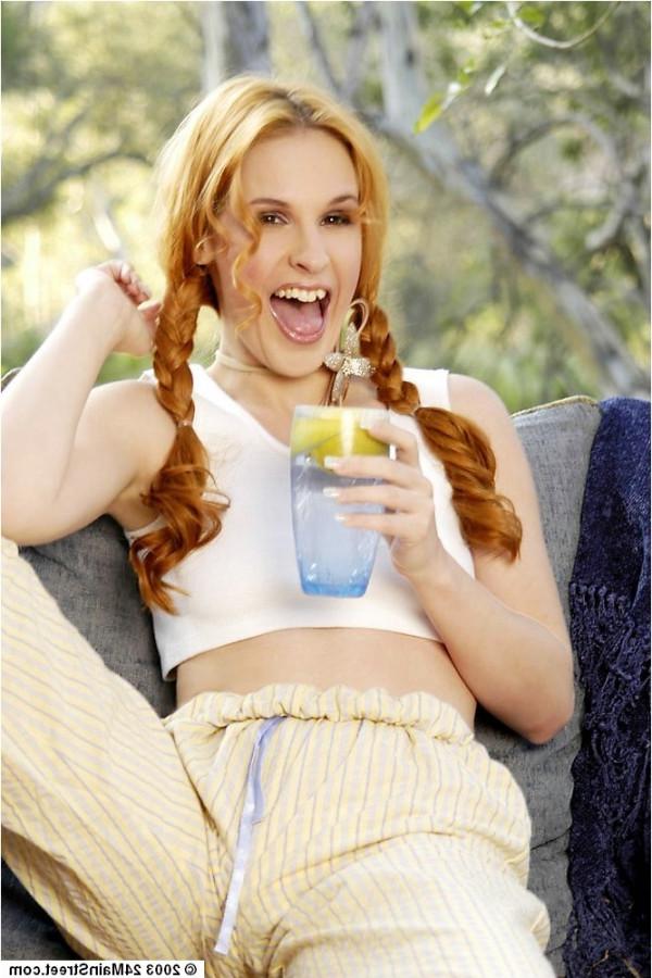 11P Beautiful redhead Chrissy Daniels could wear a suit of armor and be sexy.