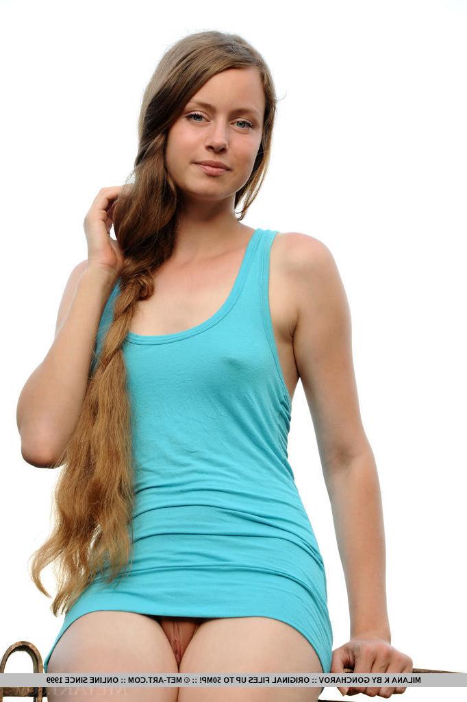 15P Gorgeous erotic teen babe Milana posing outdoors in softcore nude art