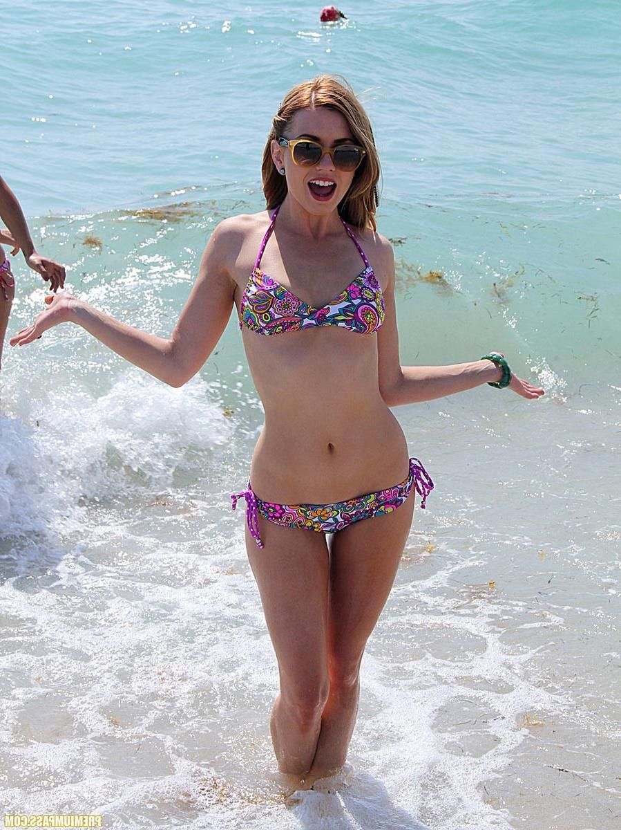 15P Horny pornstars wearing sexy bikini at the beach