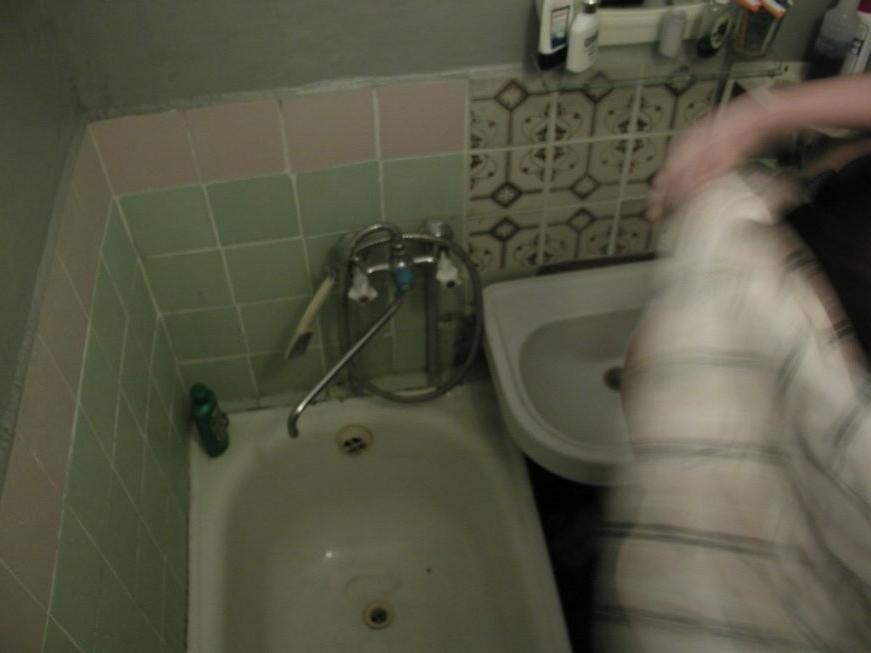 16P Ceiling voyeur hidden cam catches brunette babe in the shower