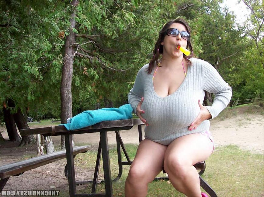 16P Plump brunette in a bikini shows off her massive melons