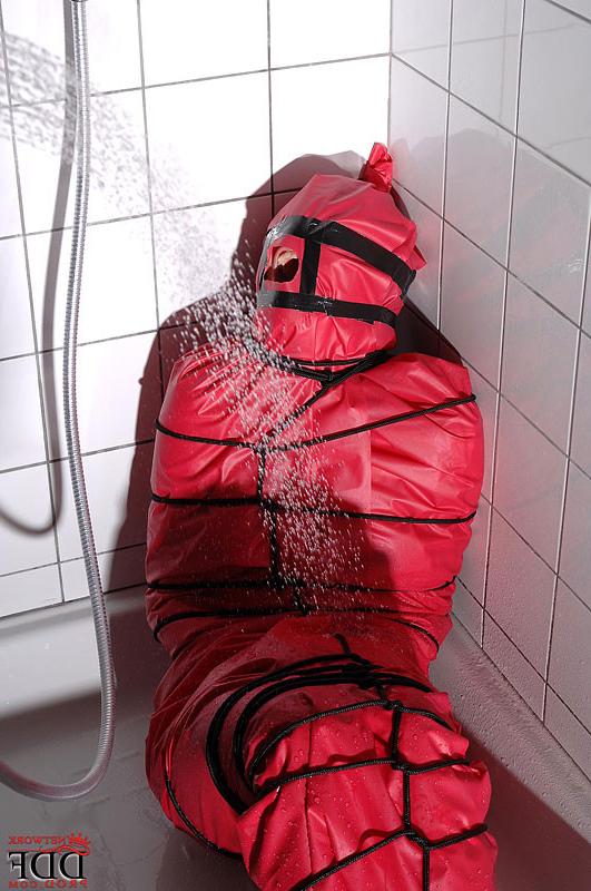 16P Miho Lechter bound in plastic in the bathroom coverd with water