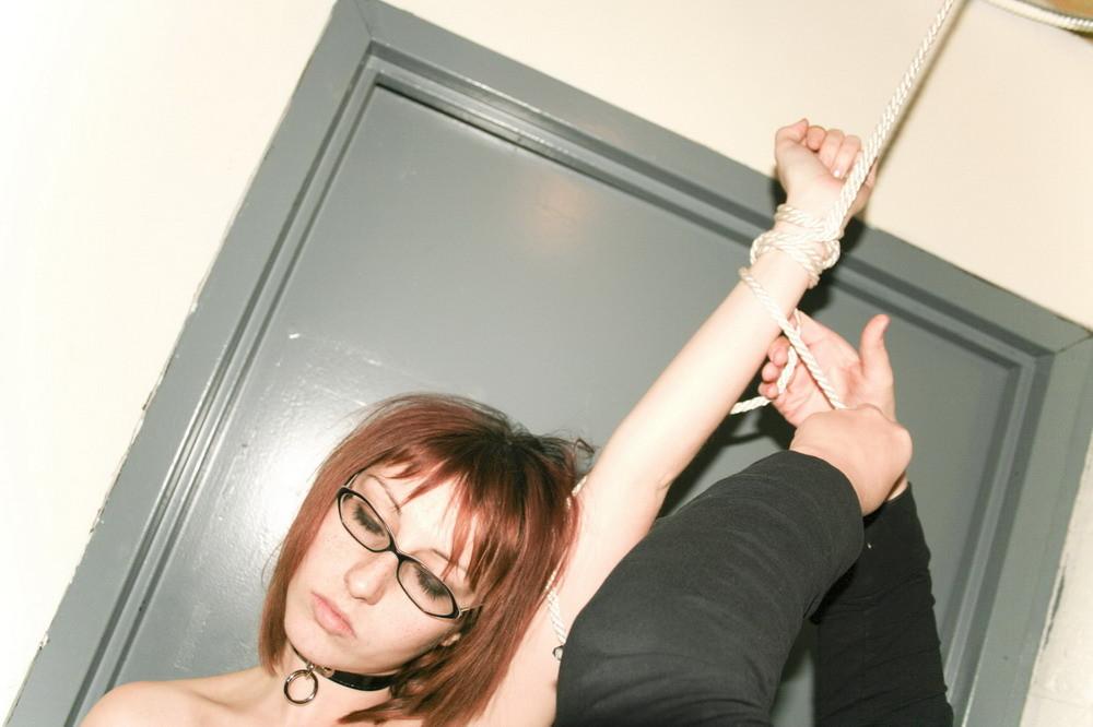 16P Marcy's thigh gets a wooden spoon beating by Mistress.