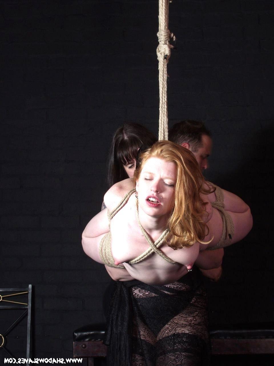 15P Cute red haired slavegirl is suspended by Master and Mistress