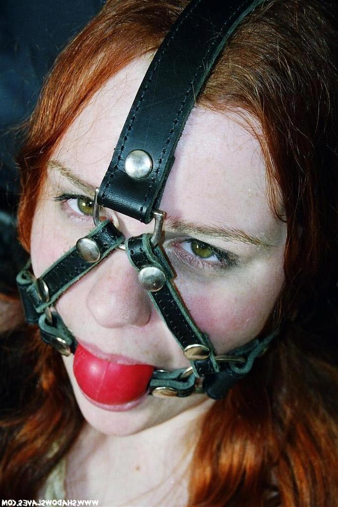 15P Pretty red haired roped and ball gagged