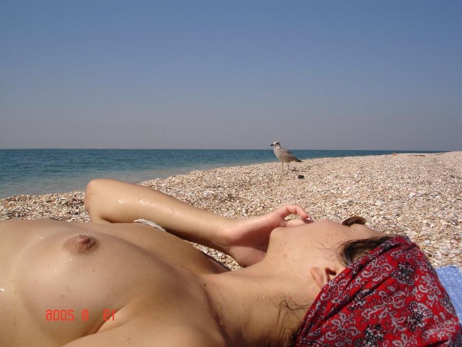 15P Long haired nudist friends love to get a total tan