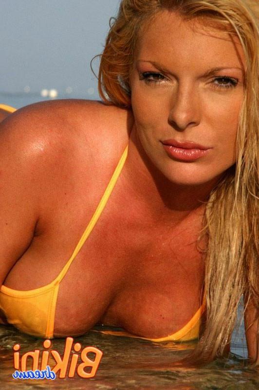 15P Blonde babe in a bikini at the beach