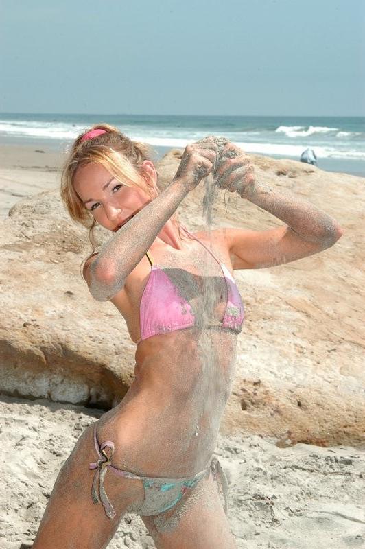 16P Petite blonde takes her bikini off at the beach