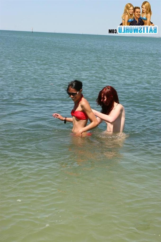 15P Three hot amateur teens take off their bikinis in the ocean