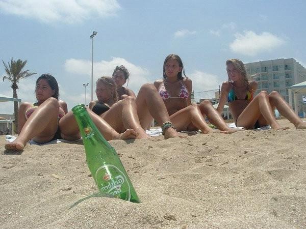 20P College teenies tanning in bikinis