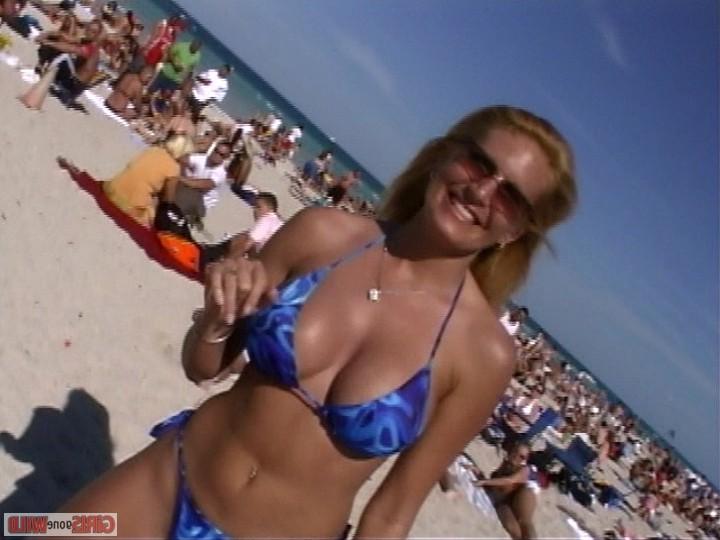 10P Young bikini babe flashes her giant juggs
