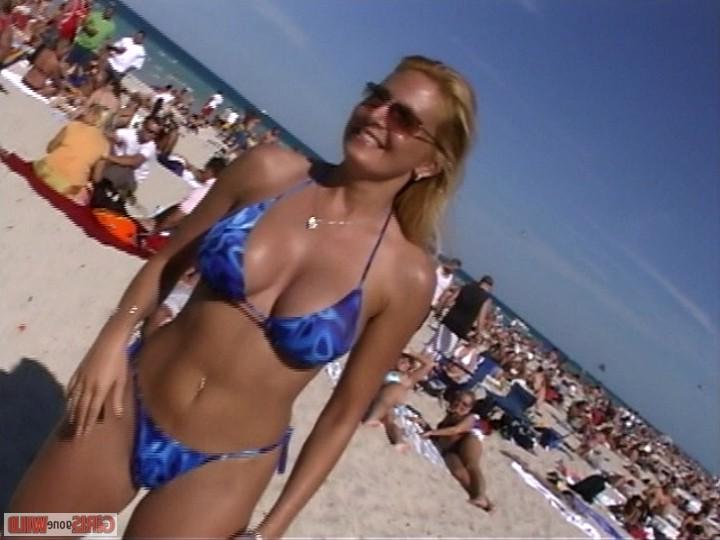 10P Young bikini babe flashes her giant juggs