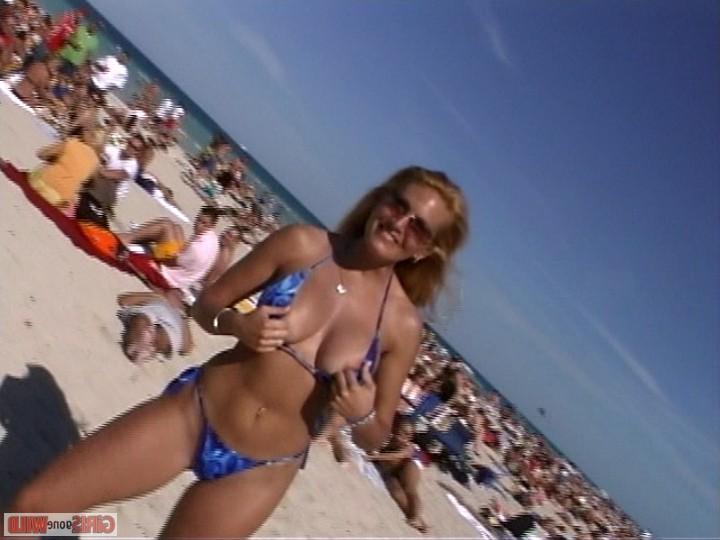10P Young bikini babe flashes her giant juggs
