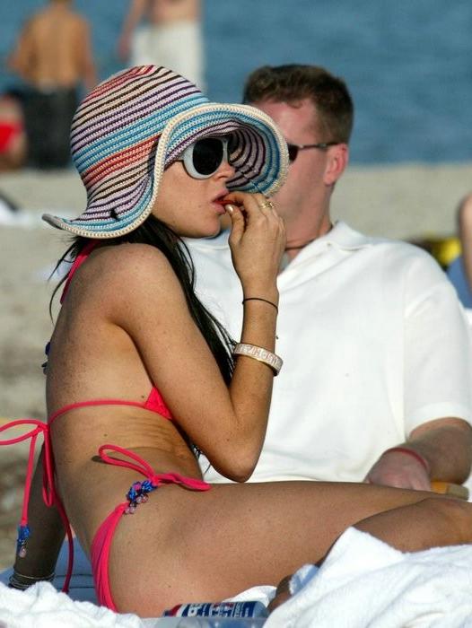 15P Freckled celebrity Lindsay Lohan in skimpy bikini