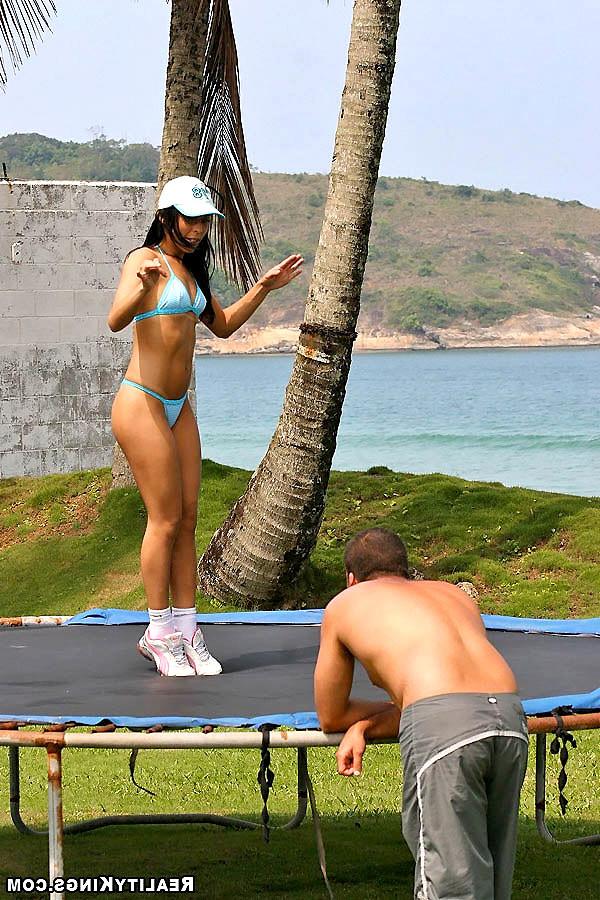 15P Firnanda gets picked up on the brazilian beach jumping on a trampoline