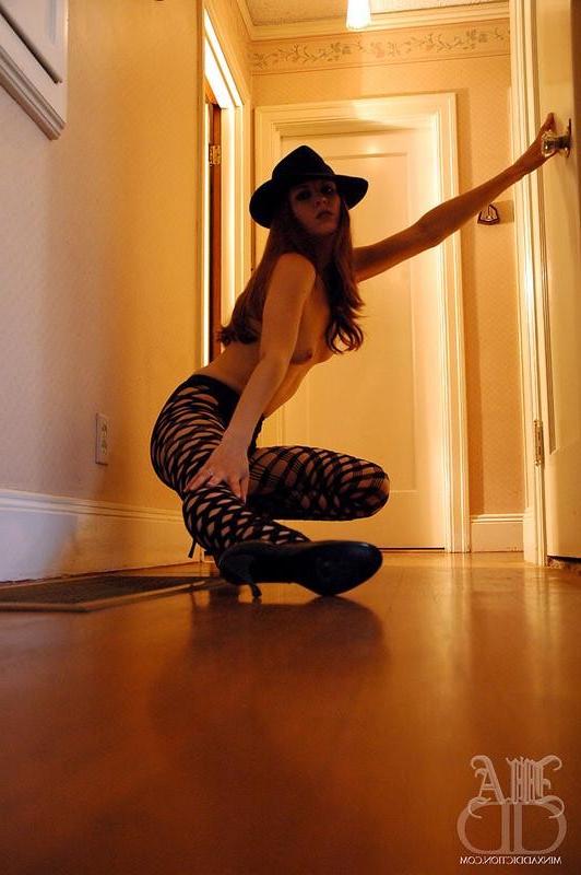 12P Young glamour redhead Minx in fishnets