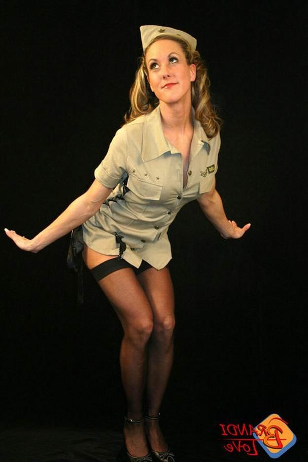 15P Brandi Love as an army girl in stockings
