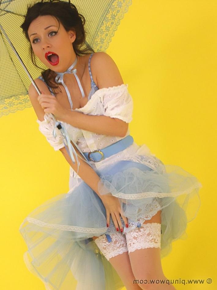 16P Gorgeous brunette with umbrella