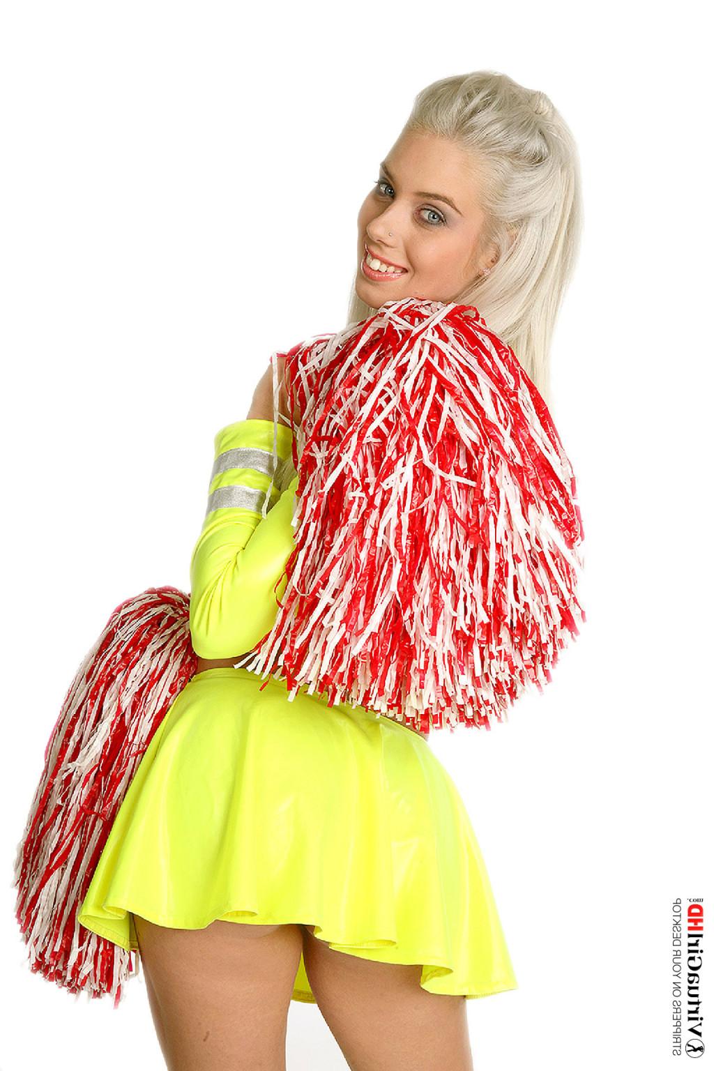 15P Blonde cheerleader taking off her uniform and showing her body
