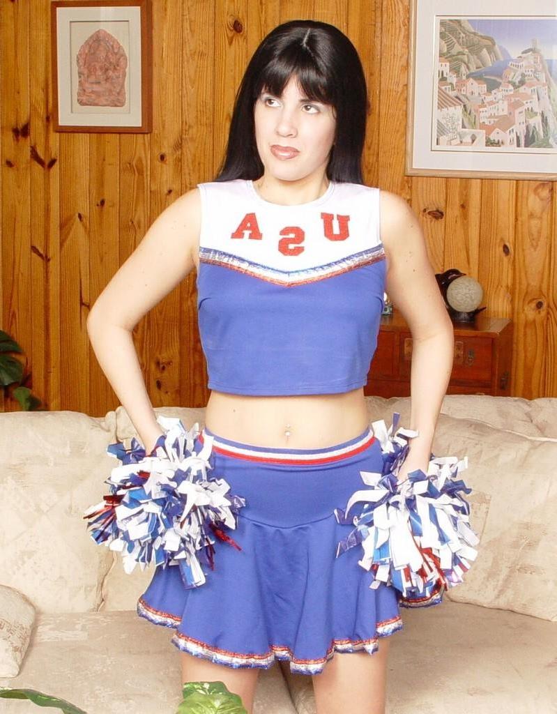20P Strip teasing horny cheerleader rubbing her shaved twat