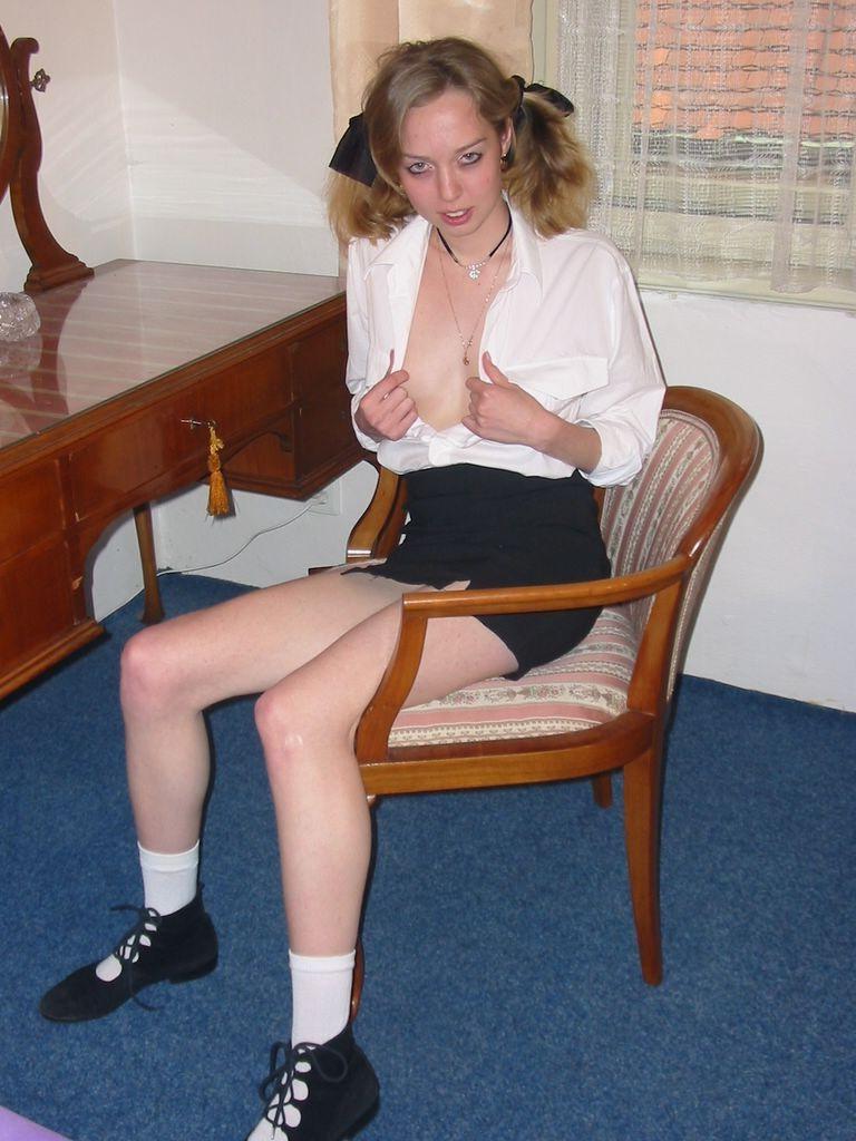 20P Horny teen in uniform stuffing her tight pussy with a dildo