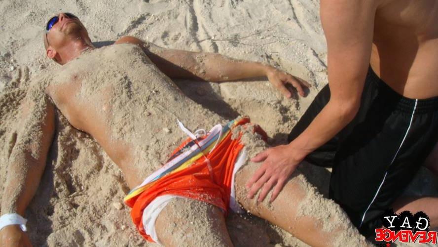 15P Hot cumshot by two guys on the beach