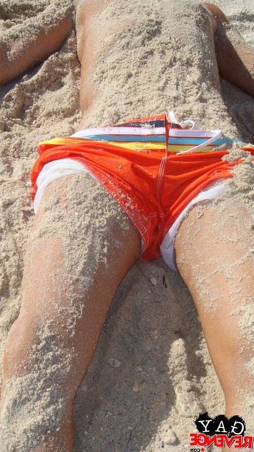15P Hot cumshot by two guys on the beach