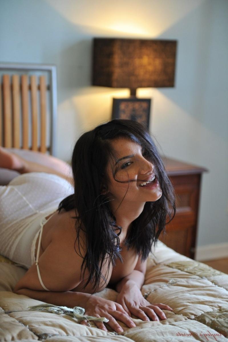 12P Busty curvy brunette in a white bodysuit